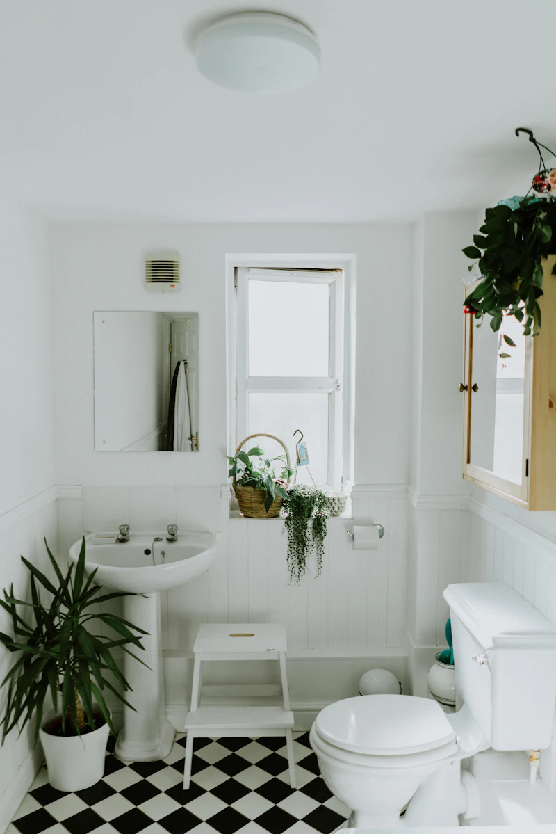 Modern minimalist bathroom with clean white surfaces